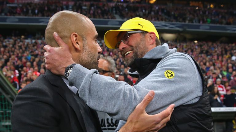 Pep Guardiola exchanges pleasantries with Jurgen Klopp during their Bundesliga days