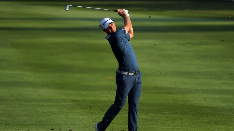 HONG KONG - DECEMBER 08:  Justin Rose of England plays his second shot into the 17th green during the first round of the UBS Hong Kong Open at The Hong Kon