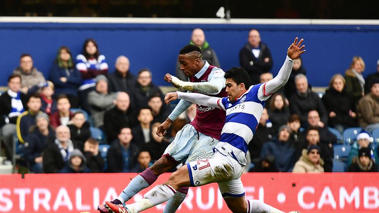 Jonathan Kodjia strikes a low shot at goal to put Aston Villa 1-0 up at Loftus Road