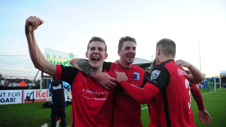 Barrow celebrates reaching the third round of the FA Cup