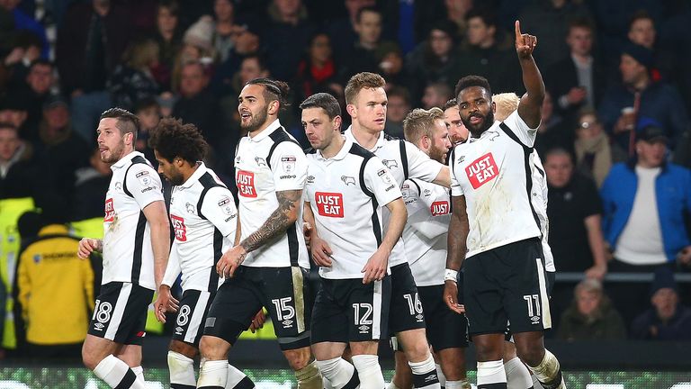 Darren Bent celebrates with his Derby team-mates after putting them ahead in the match against Brimingham