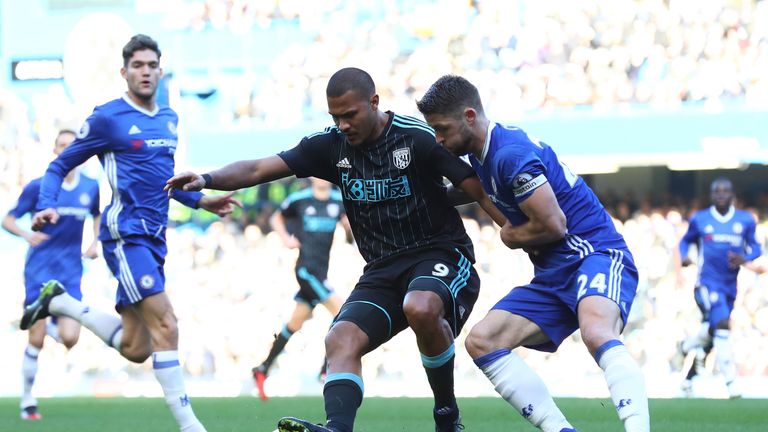 Salomon Rondon of West Bromwich Albion controls the ball under pressure of Gary Cahill of Chelsea