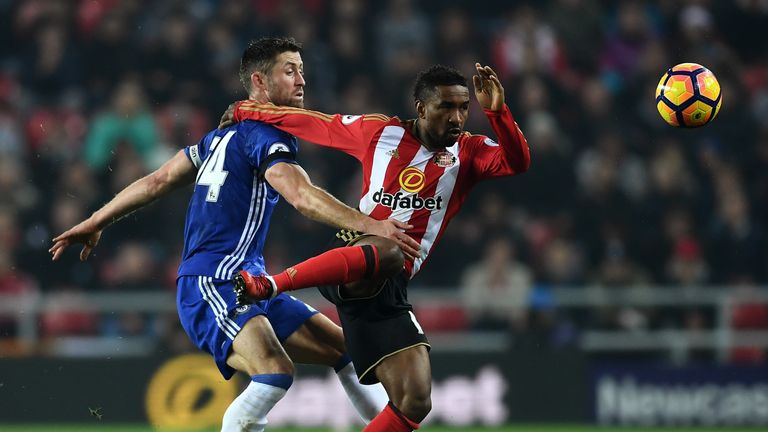 SUNDERLAND, ENGLAND - DECEMBER 14: Jermain Defoe of Sunderland and Gary Cahill of Chelsea compete for the ball during the Premier League match between Sund