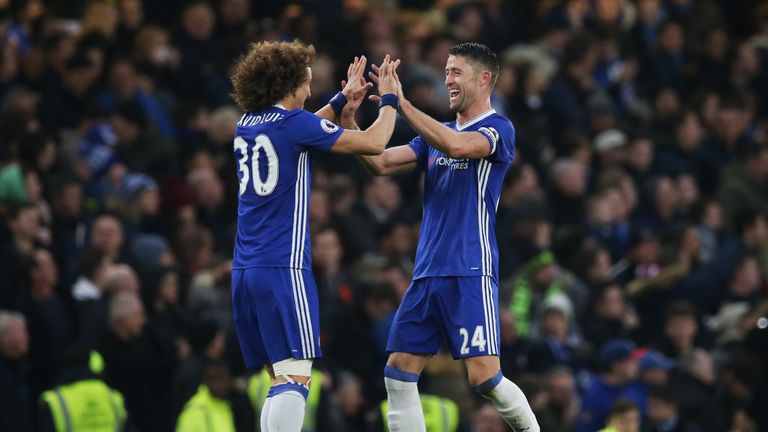 Gary Cahill (R) of Chelsea celebrates scoring the opening goal with his team mate David Luiz (L) during the Premier League 