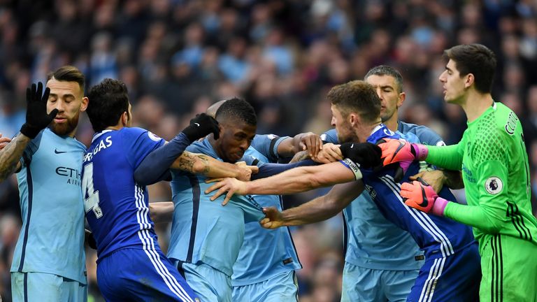 Tempers flare at the Etihad as  Gary Cahill of Chelsea and Kelechi Iheanacho of Manchester City square off 