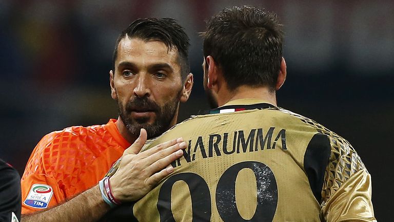 Gianluigi Buffon embraces Gianluigi Donnarumma after the Serie A match between AC Milan and Juventus 