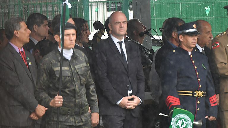 FIFA president Gianni Infantino (C) attends the funeral of the members of the Chapecoense Real football club team killed in a plane crash in Colombia, at t