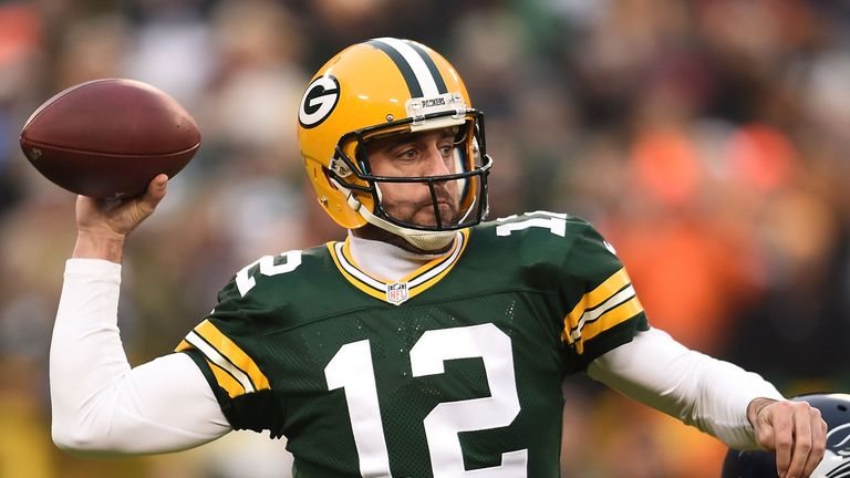 GREEN BAY, WI - DECEMBER 11: Aaron Rodgers #12 of the Green Bay Packers throws a pass during the game against the Seattle Seahawks at Lambeau Field on Dece