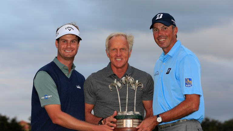 NAPLES, FL - DECEMBER 10: (L) Harris English and his teammate (R) Matt Kuchar pose with the the tournament trophy and host (C) Greg Norman following their 