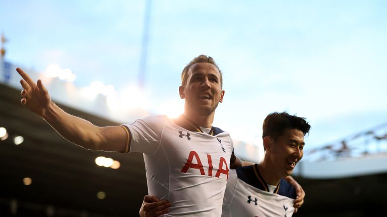 Tottenham Hotspur's Harry Kane (left) celebrates with team-mate Son Heung-Min (right) after scoring his side's first goal v Swansea