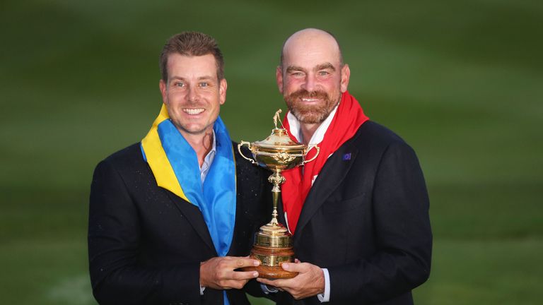 AUCHTERARDER, SCOTLAND - SEPTEMBER 28: Henrik Stenson and Thomas Bjorn of Europe pose with the Ryder Cup trophy after the Singles Matches of the 2014 Ryder