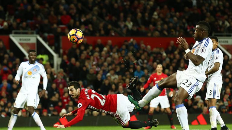 Henrikh Mkhitaryan scores Manchester United's third with an acrobatic flick of the heel