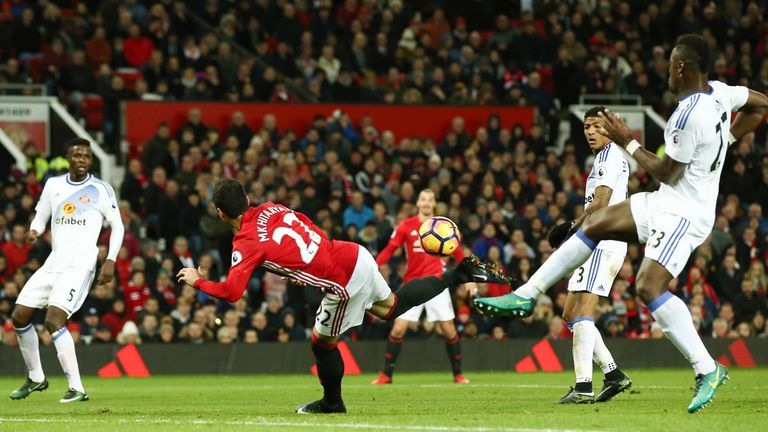 Henrikh Mkhitaryan scores Manchester United's third with a back heel