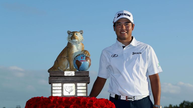 NASSAU, BAHAMAS - DECEMBER 04:  Hideki Matsuyama of Japan poses with the trophy after winning the Hero World Challenge at Albany, The Bahamas on December 4