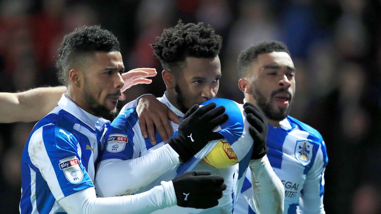 Huddersfield Town's Kasey Palmer (centre) celebrates scoring his side's first goal of the game