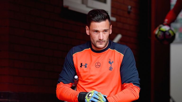 Hugo Lloris makes his way out to the pitch to warm up