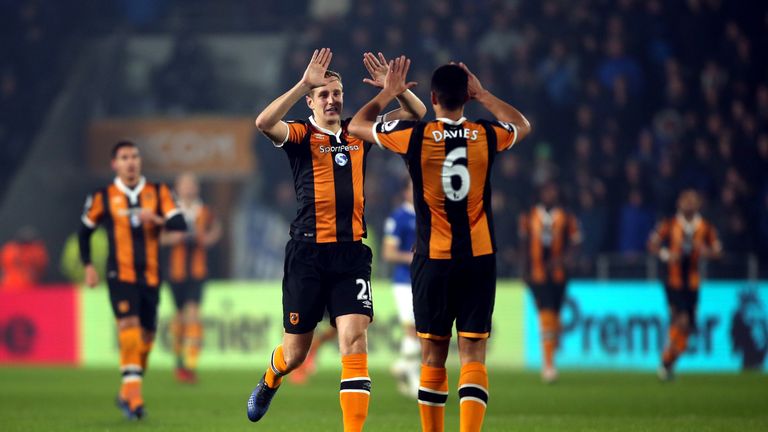 Hull City's Michael Dawson (left) celebrates scoring his side's first goal of the game with Curtis Davies during the Premier League match at the KCOM Stadi