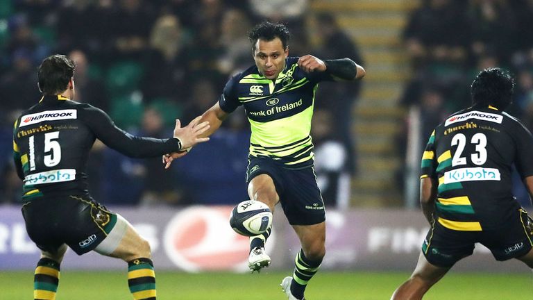 Leinster's Isa Nacewa knocks the ball between two Northampton players