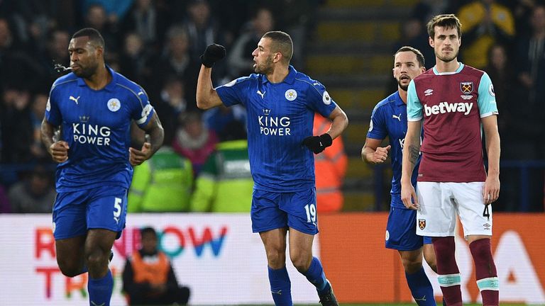 Islam Slimani (C) celebrates scoring Leicester's opening goal