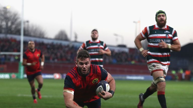 Jaco Taute of Munster dives in for a try during the European Champions Cup match between Munster and Leicester Tigers