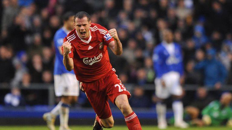 LIVERPOOL, ENGLAND - NOVEMBER 29:  Jamie Carragher of Liverpool celebrates his team's second goal during the Barclays Premier League match between Everton 