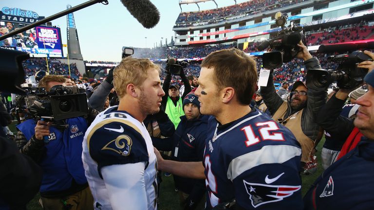 FOXBORO, MA - DECEMBER 04:  Jared Goff #16 of the Los Angeles Rams greets Tom Brady #12 of the New England Patriots after the New England Patriots defeated