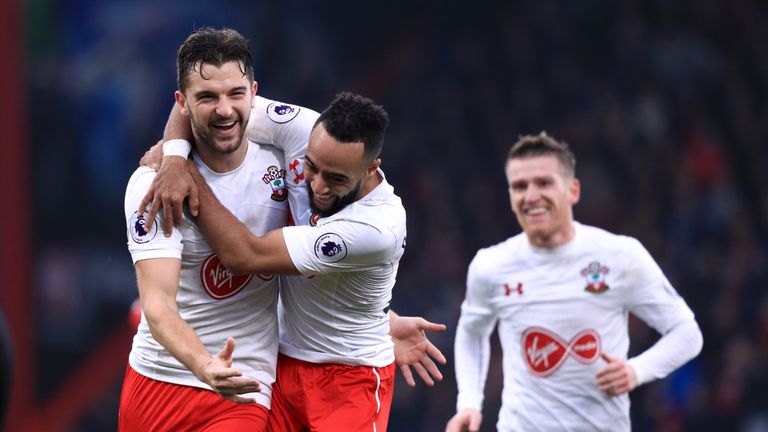 Jay Rodriguez and team-mate Nathan Redmond celebrate Southampton's third goal at the VitalitY Stadium