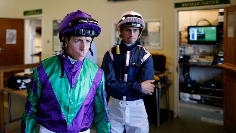 Jim Crowley (L) 