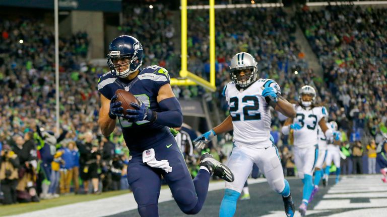 SEATTLE, WA - DECEMBER 04:  Tight end Jimmy Graham #88 of the Seattle Seahawks scores a touchdown against the Carolina Panthers at CenturyLink Field on Dec