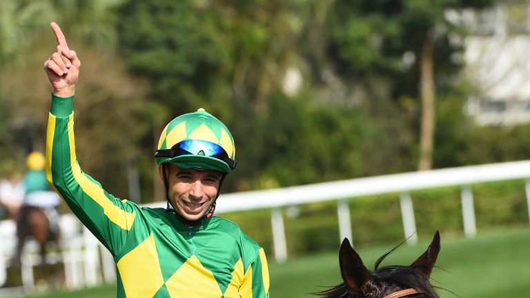 HONG KONG - DECEMBER 11:  Joao Moreira riding Satono Crown of Japan after winning Race 4 the Longines Hong Kong Vase during Hong Kong International Racing 