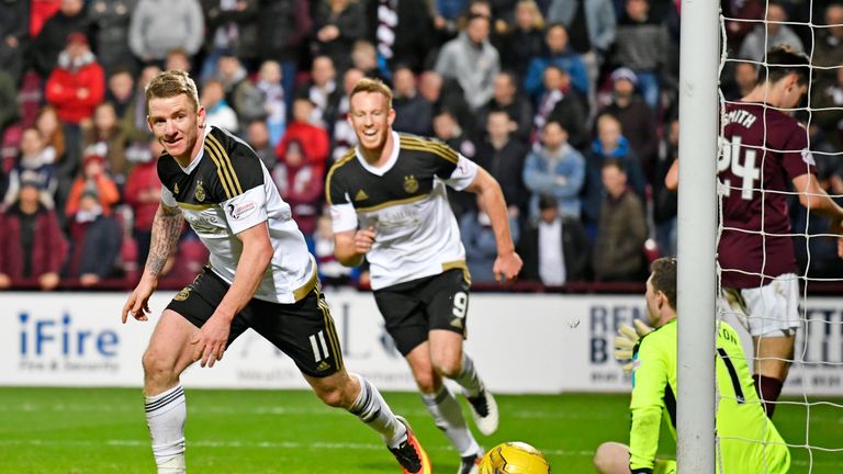 Jonny Hayes wheels away after he scores for Aberdeen away to Hearts