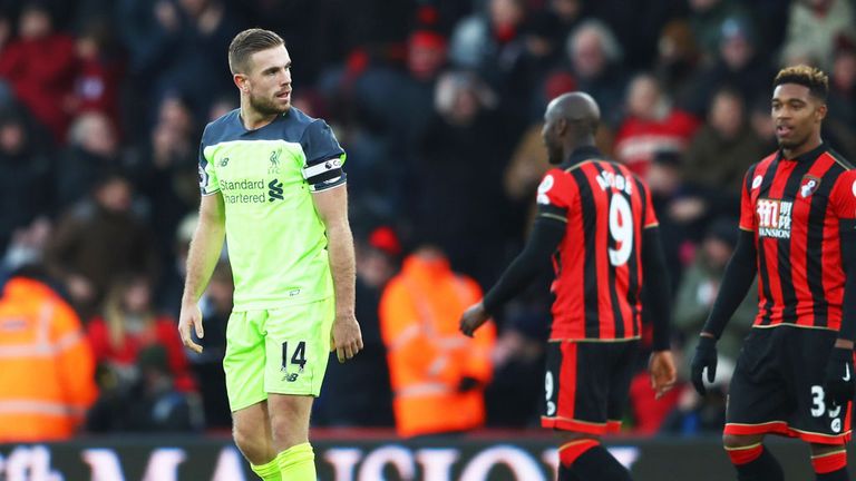 Liverpool skipper Jordan Henderson is dejected after the loss at Bournemouth