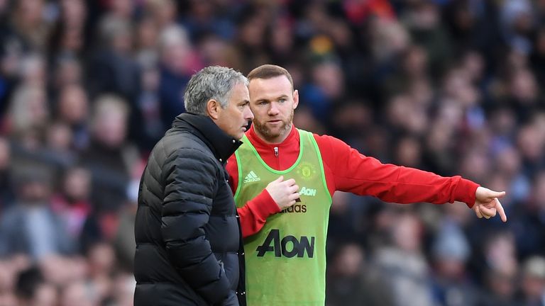 MANCHESTER, ENGLAND - NOVEMBER 19:  Jose Mourinho, Manager of Manchester United (L) speaks to Wayne Rooney of Manchester United (R)  during the Premier Lea