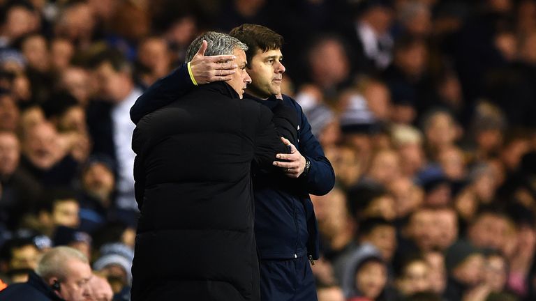 LONDON, ENGLAND - JANUARY 01:  Jose Mourinho manager, of Chelsea hugs Mauricio Pochettino, manager of Spurs towards the end of the Barclays Premier League 