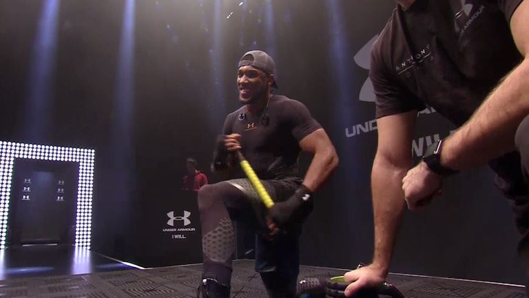 Joshua goes through his usual routine before his public workout