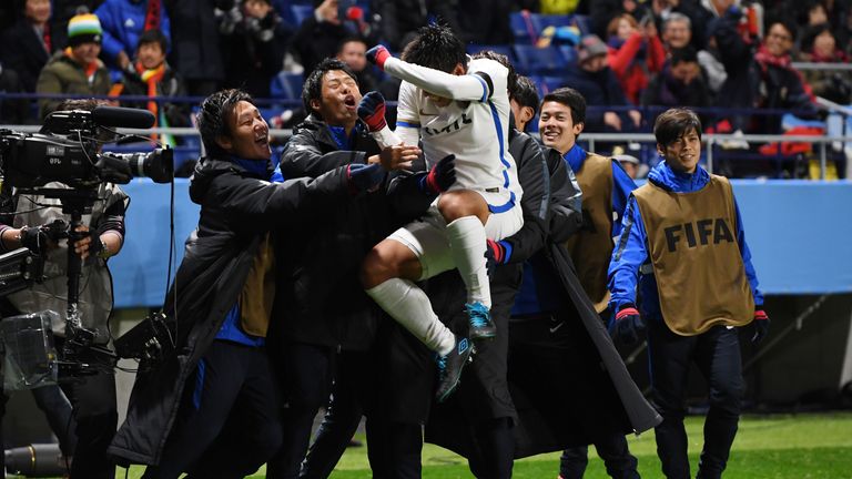 Kashima Antlers celebrate following the earlier penalty controversy