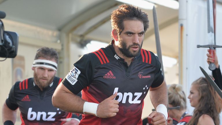 CHRISTCHURCH, NEW ZEALAND - FEBRUARY 27: Samuel Whitelock of the Crusaders leads his team onto the field followed by Kieran Read prior to the round one Sup