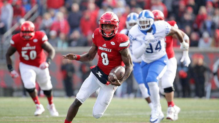 LOUISVILLE, KY - NOVEMBER 26:  Lamar Jackson #8 of the Louisville Cardinals runs with the ball during the game against the Kentucky Wildcats at Papa John's