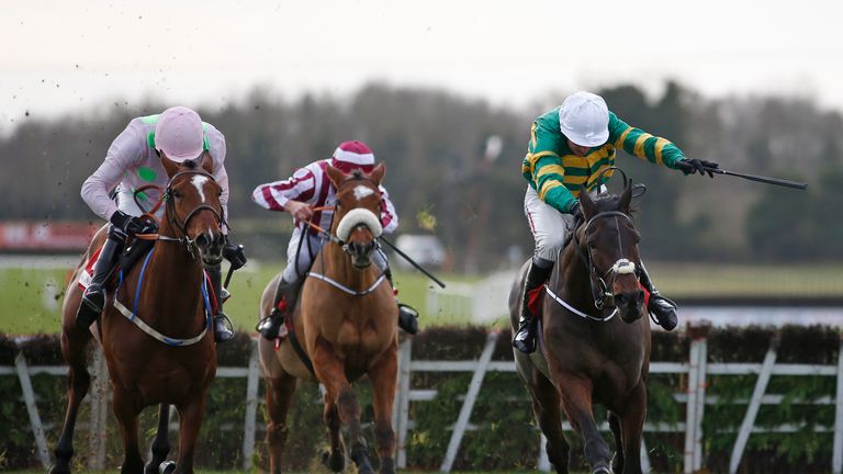Barry Geraghty riding Landofhopeandglory (R) clear the last to win the Bar One Racing Juvenile Hurdle from Bapaume
