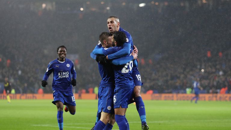 Jamie Vardy of Leicester celebrates scoring his side's third goal with Islam Slimani 