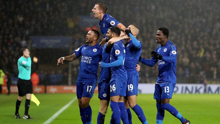 Andy King celebrates scoring his sides second goal with his Leicester City team mates during the match against Manchester City