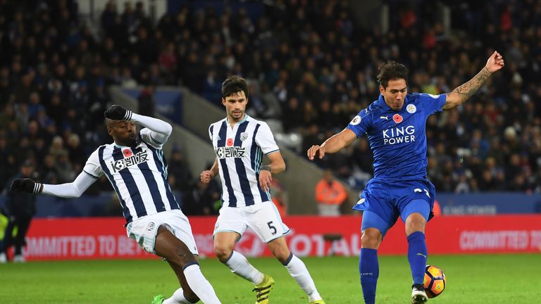 LEICESTER, ENGLAND - NOVEMBER 06:  Leonardo Ulloa of Leicester City and Allan Nyom of West Bromwich Albion in action during the Premier League match betwee