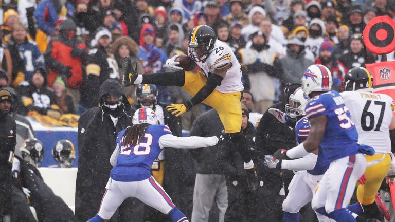 ORCHARD PARK, NY - DECEMBER 11:  Le'Veon Bell #26 of the Pittsburgh Steelers jumps over  Ronald Darby #28 of the Buffalo Bills during the second half at Ne