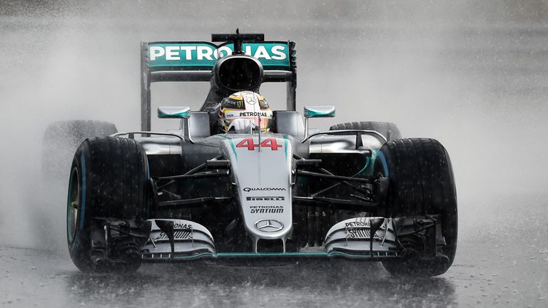 Lewis Hamilton drives through the rain in Hungary - Picture from Sutton Images 