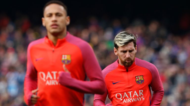Barcelona's Argentinian forward Lionel Messi (R) and Barcelona's Brazilian forward Neymar warm up before the Spanish league football match FC Barcelona vs 