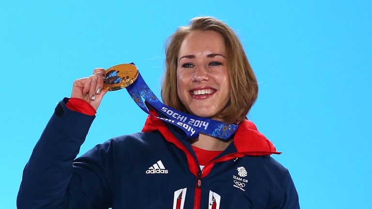 SOCHI, RUSSIA - FEBRUARY 15:  Gold medalist Lizzy Yarnold of Great Britain celebrates on the podium  during the medal ceremony for the Women's Skelton on d