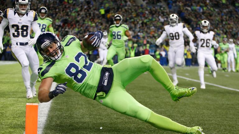 SEATTLE, WA - DECEMBER 15:  Tight end Luke Willson #82 of the Seattle Seahawks scores a touchdown against the Los Angeles Rams at CenturyLink Field on Dece