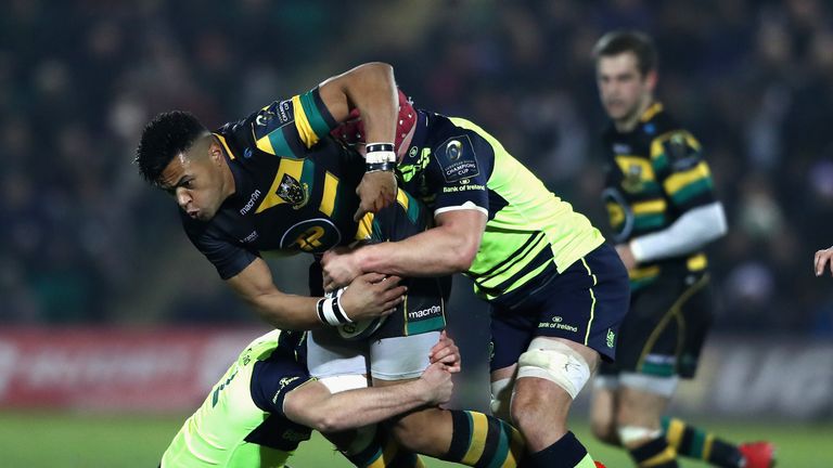 NORTHAMPTON, ENGLAND - DECEMBER 09:  Luther Burrell of Northampton is tackled during the European Rugby Champions Cup match between Northampton Saints and 