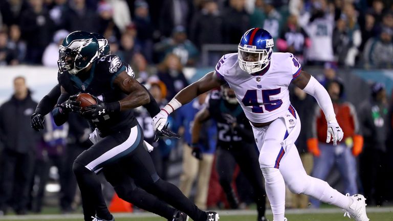 PHILADELPHIA, PA - DECEMBER 22:  Strong safety Malcolm Jenkins #27 of the Philadelphia Eagles intercepts a ball intended for tight end Will Tye #45 of the 