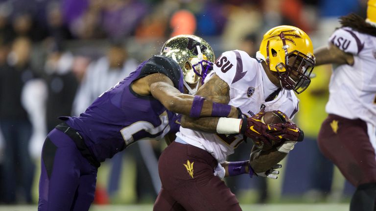 SEATTLE, WA - OCTOBER 25: Jaelen Strong #21 of the Arizona State Sun Devils scores a touchdown as defensive back Marcus Peters of the Washington Huskies de